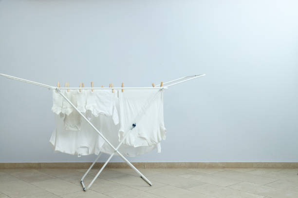 istock Clothes are dried on the dryer after washing 1869807873