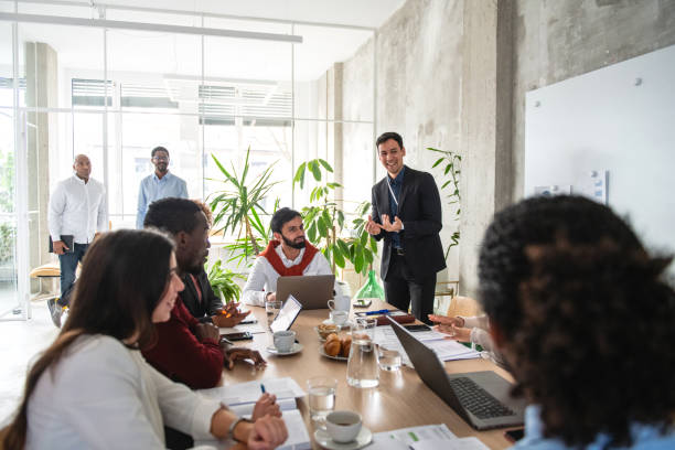istock Multicultural Group Of Coworkers In A Meeting 1869809545
