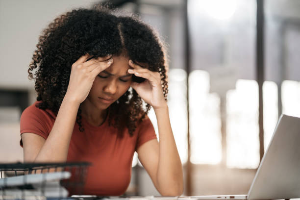 istock Stress businesswoman is sitting at table, under stress from working. 1869817215