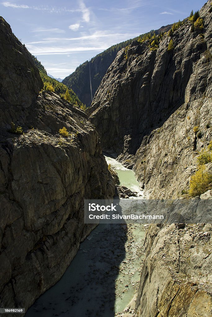 Canyon In The Swiss Alps October 2013, canyon in the Swiss Alps with a river from a glacier Blue Stock Photo