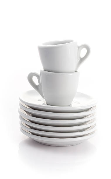 istock two espresso cups and saucers isolated on a white background 186982390