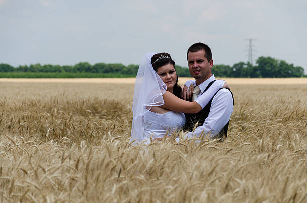 istock wedding couple in a wheat land 186982802