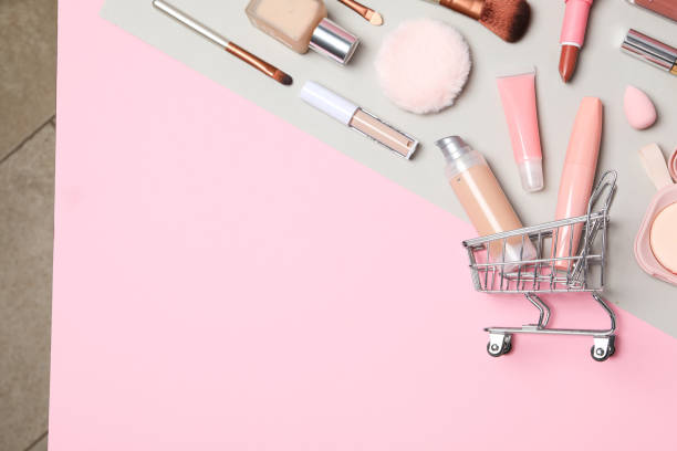 istock Golden shopping basket with pink makeup accessories 1869832824