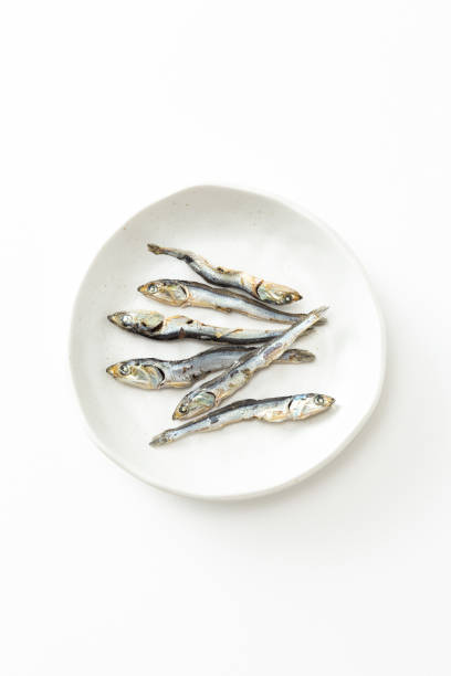 istock Dried sardines on a white background. 1869837545