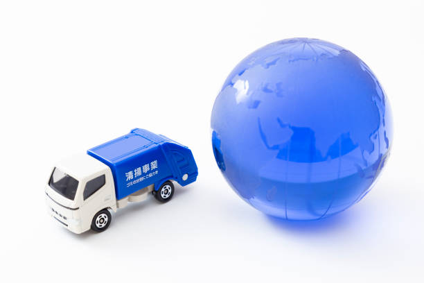 istock Garbage truck and the earth. 1869842382