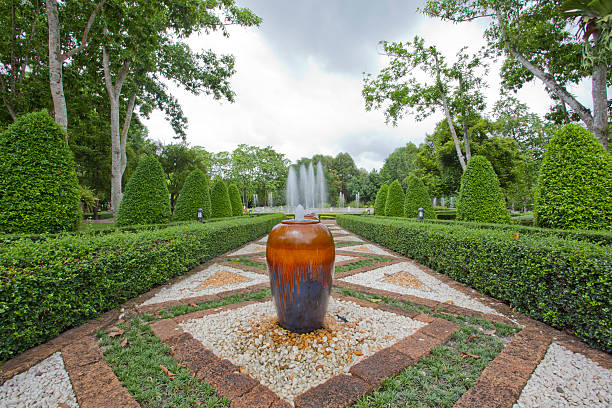 istock Beautiful garden with fountain 186984614