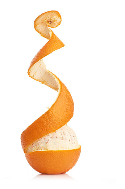istock orange with peeled spiral skin 186986164