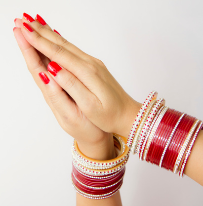 Indian married woman hands welcome gesture