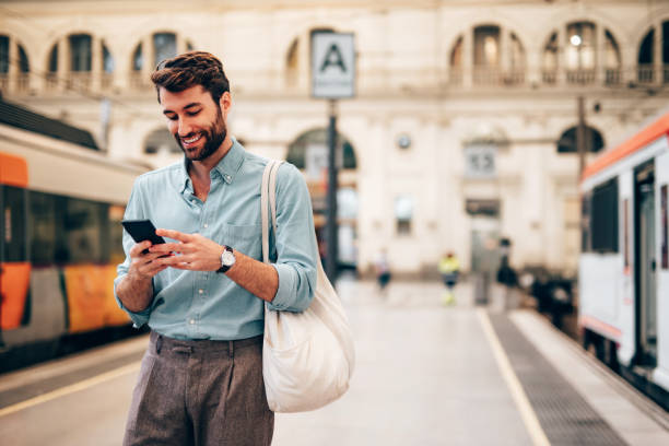 istock Young confident businessman at subway station 1869869723