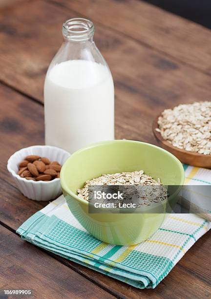Bowl Of Oatmeal With Almonds And Milk Stock Photo - Download Image Now - Almond, Bowl, Breakfast