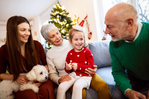 istock Multi-generational family enjoying Christmas together 1869903503