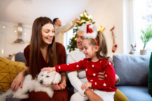 istock Multi-generational family together celebrating winter holidays 1869904058