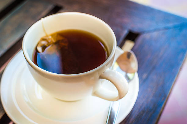 istock Cup of tea on a wooden table classic 186991103