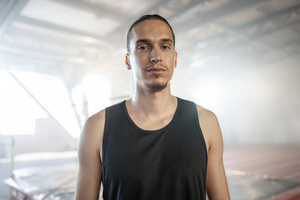istock Athlete man standing in sports hall 1869912569