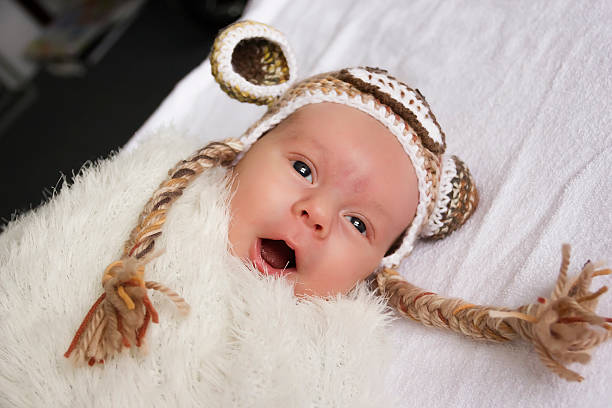 baby in a hat with ears stock photo