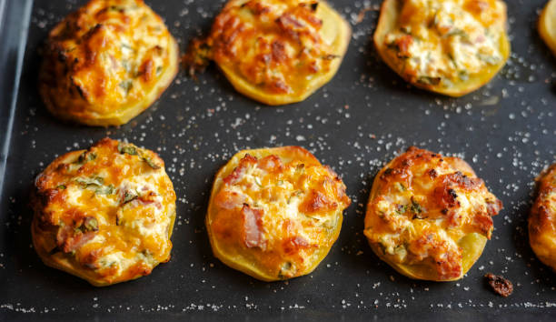 istock appetizer perfection capturing cut potatoes filled with delectable stuffing in a tray party food 1869922131