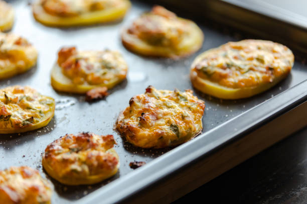 istock appetizer perfection capturing cut potatoes filled with delectable stuffing in a tray party food 1869922134