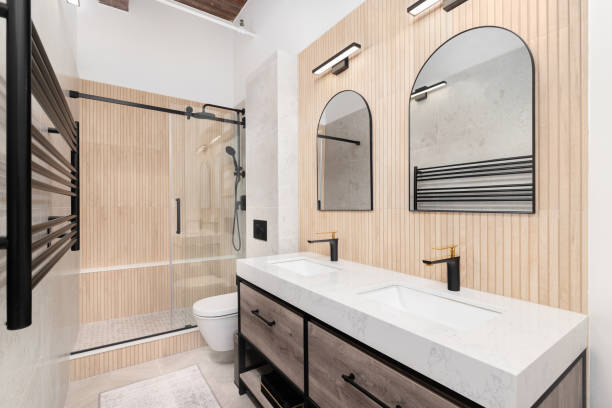 istock A bathroom with wood slat paneling accent and a wood tiled shower. 1869926321