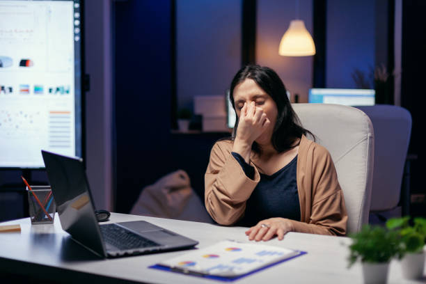 istock Portrait of freelancer having a headache 1869937663