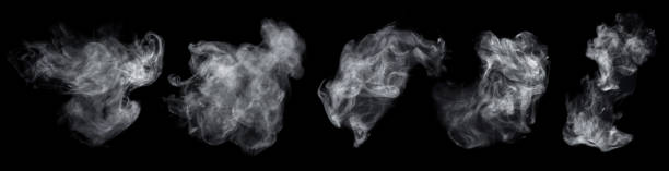 istock Fog or smoke set isolated on black background. White cloudiness, mist or smog background. Collection of varied white smoke on a black background. 1869949139