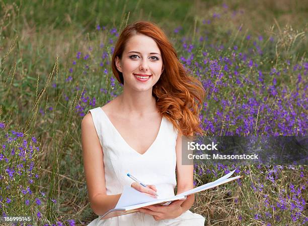 Redhead Girl With Note At Outdoor Stock Photo - Download Image Now - Adult, Autumn, Beauty