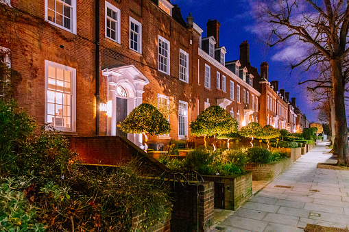 Street of luxury houses in Ilchester Place in Holland Park, London, UK