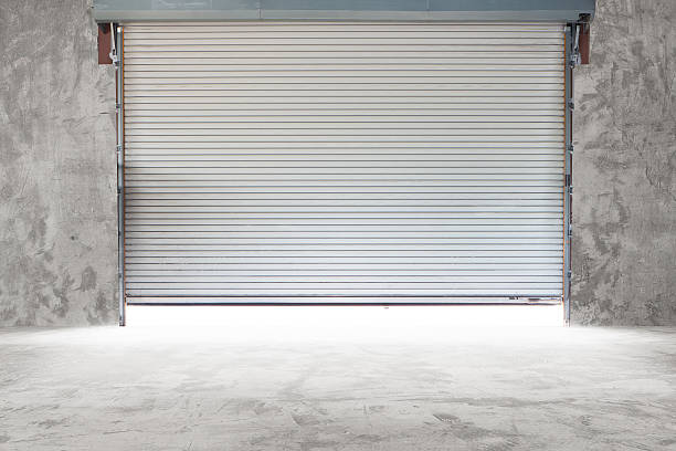 istock Interior view of a building with a roller shutter door 186995876