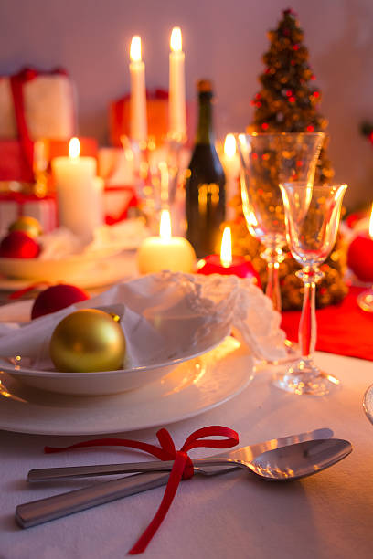 istock Cutlery with red ribbon on the holiday table 186996264
