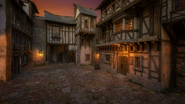 istock Cobbled street in a medieval fantasy town in evening light. 3D rendering. 1869976694