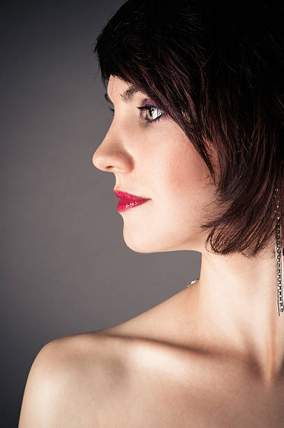 istock beautiful woman in profile 186997733