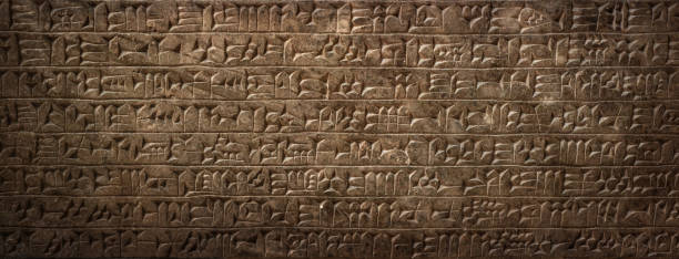 istock Ancient cuneiform Sumerian text. Historical background on the theme of civilizations of Assyria, Mesopotamia, Babylon, interfluve, Sumerian. Ancient archaeological background. 1869990983