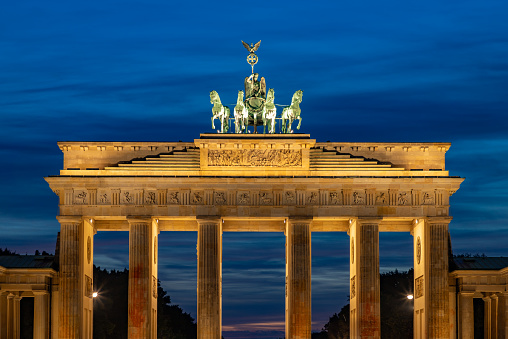 A picture of the Brandenburg Gate at sunset.