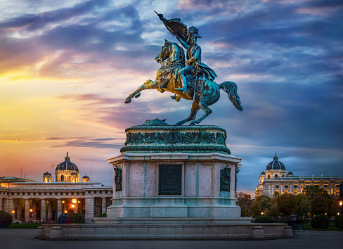 Statue of Archduke Charles of Vienna, Austria. Evening view of the city center of Vienna, Austria.