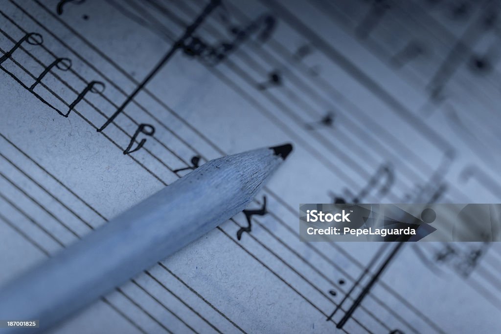 Trabajando en una composición musical - Foto de stock de Anticuado libre de derechos