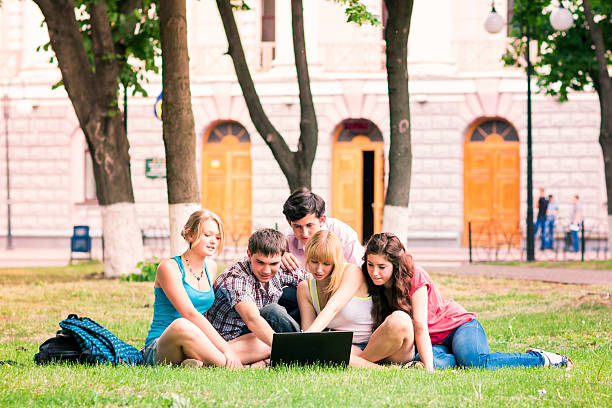 istock Group of happy smiling Teenage Students 187003439