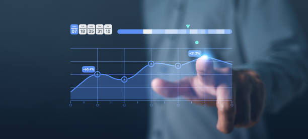 istock typing keyboard and touching on line graph unlocking success. business growth at your fingertips. 1870037456