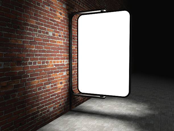 istock 3d Blank street advertising billboard on brick wall at night 187004094