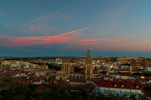 View of the city of Burgos, Spain, with the cathedral in the middle, at sunset.