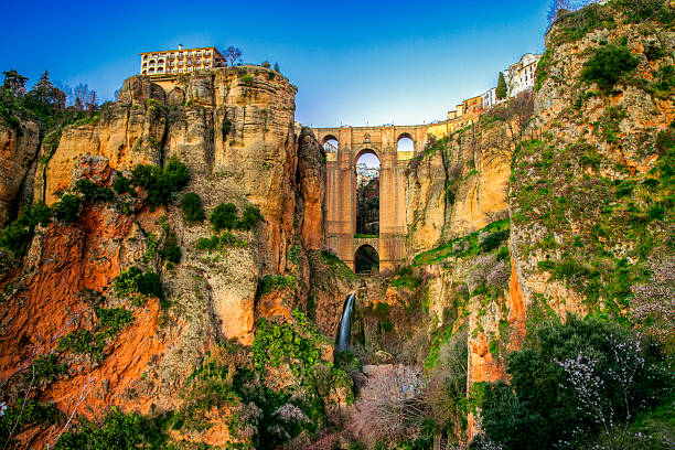 Overgrowth showing on the village of Ronda in Andalusia stock photo