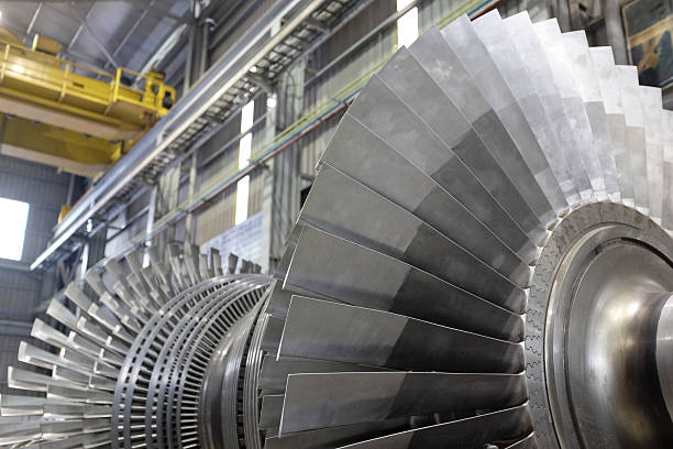 Rotor of a steam turbine Internal rotor of a steam Turbine at workshop large machine stock pictures, royalty-free photos & images