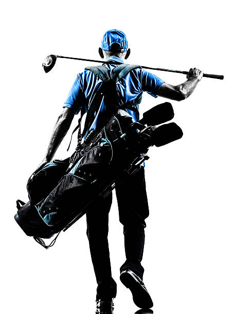 istock man golfer golfing golf bag walking silhouette 187011552