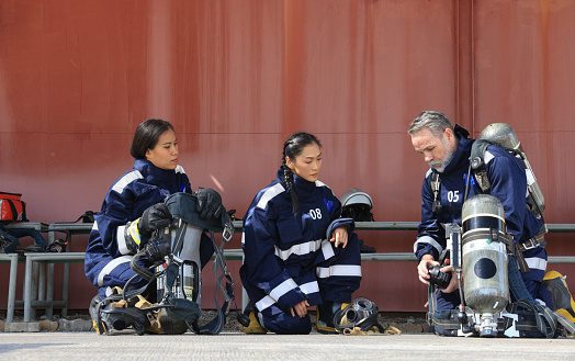 Specialist Fire fighter and Rescue train new female rescue for extinguishing