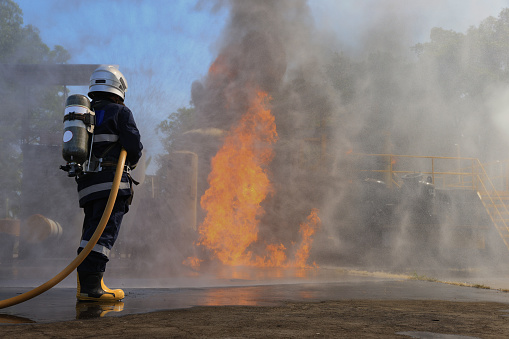 Rescue Fire fighter practice extinguishing