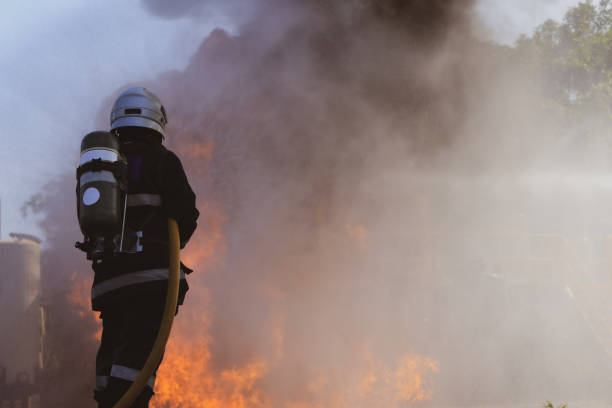 istock Rescue Fire fighter practice extinguishing 1870125628