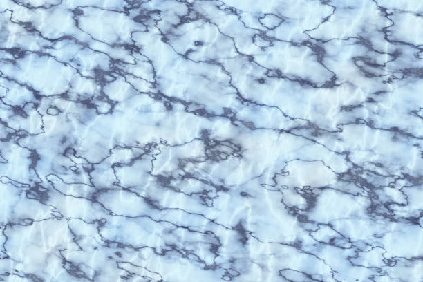 istock Magnifying medium blue marble's design from stone slab to sublime backdrop. Subtle beauty in simple textures. 1870139704