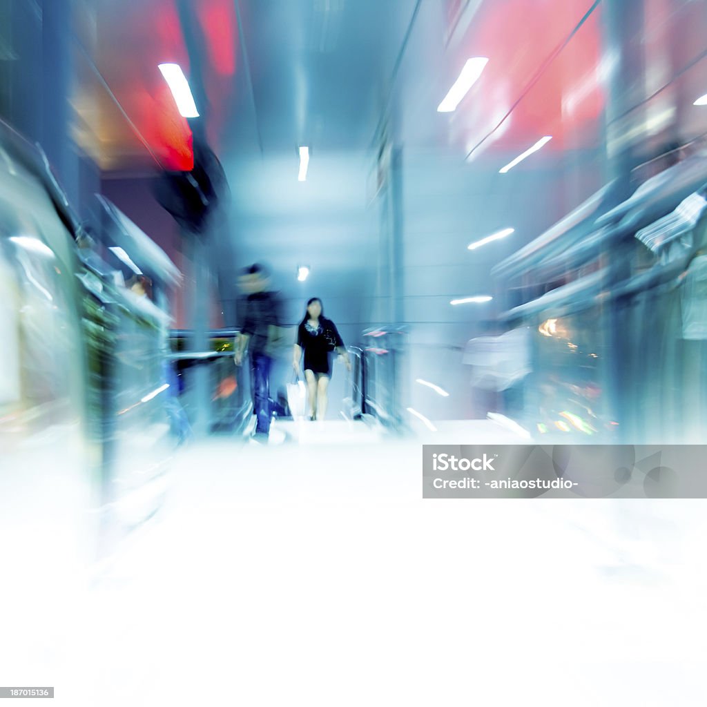 business people crowd walking at bus station Blurred business people crowd walking at bus station. Abstract Stock Photo