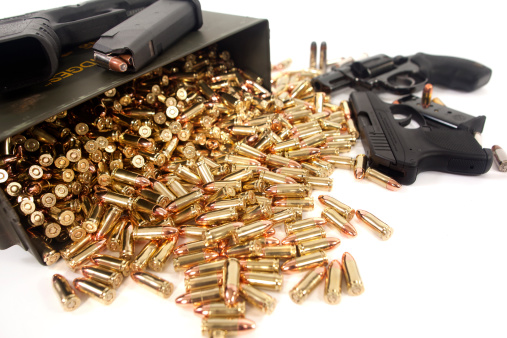 Assorted guns and ammunition.