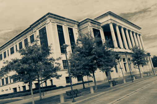 United States district courthouse in Lafayette, Louisiana taken from the corner of West Vermilion and Lafayette. Toned development for period look.