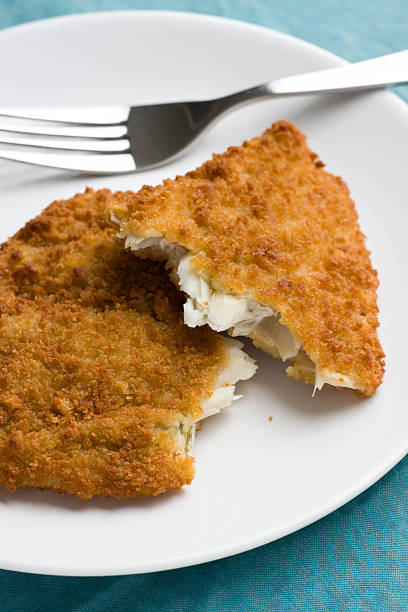 istock Breaded fish fillet served on a plate 187019138