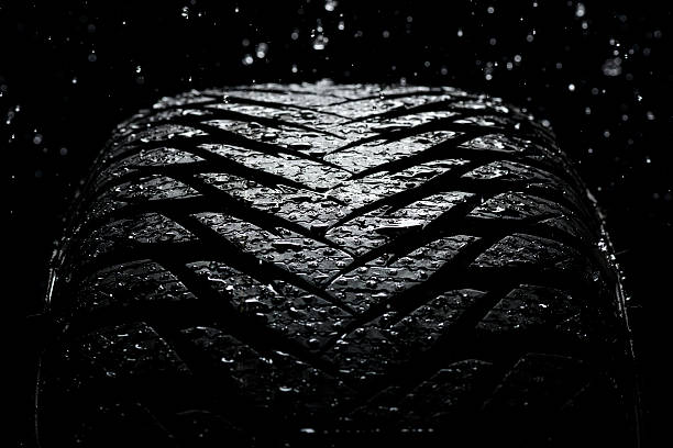 istock New wet tire while raining 187019418